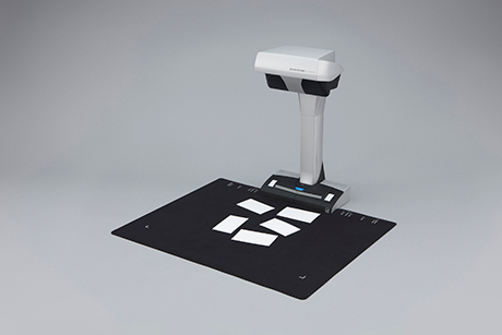 The ScanSnap SV600 is an overhead style contactless scanner that provides a new perspective on document scanning. Unlike the typical scanner, you can easily scan newspapers, magazines, books or documents of up to 30mm thick directly with the overhead LED, without cutting or damaging them. - Image 2